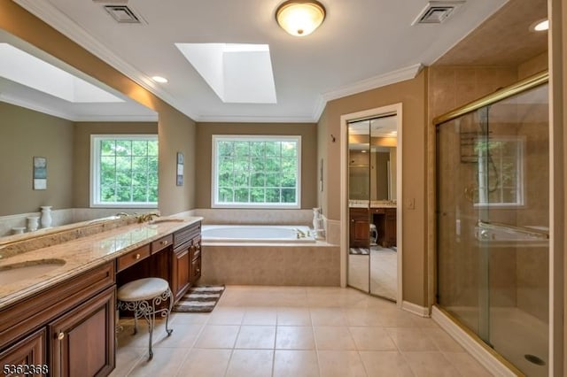 16 Olde York Rd, Randolph Twp, NJ 07869 - bathroom featuring double vanity, a skylight, tile patterned floors, a garden tub, and crown molding
