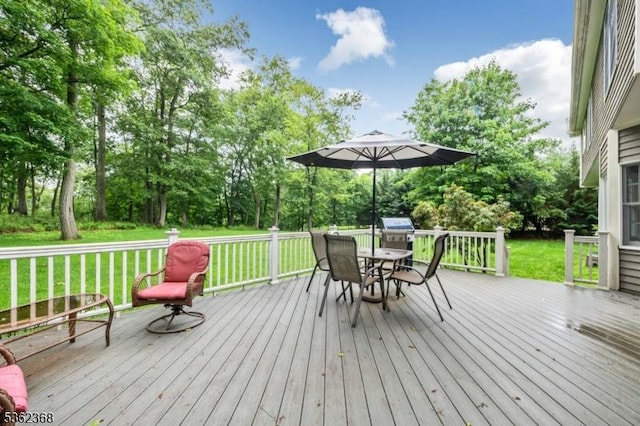 16 Olde York Rd, Randolph Twp, NJ 07869 - deck with outdoor dining area, a yard, view of scattered trees, and area for grilling