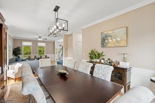 7 Cranberry Ct, North Haledon Boro, NJ 07508 - dining space with crown molding, a ceiling fan, and a chandelier