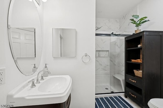 7 Cranberry Ct, North Haledon Boro, NJ 07508 - bathroom featuring a marble finish shower, toilet, and a sink