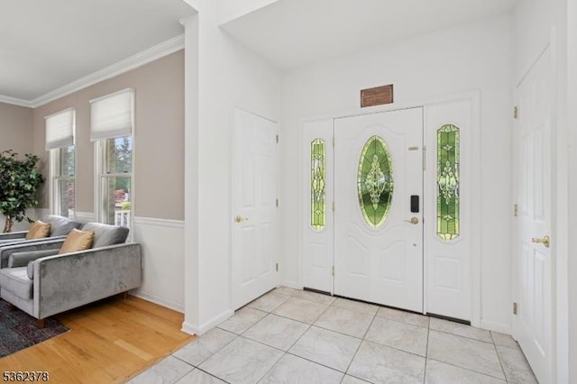 7 Cranberry Ct, North Haledon Boro, NJ 07508 - foyer with crown molding, baseboards, and light tile patterned flooring