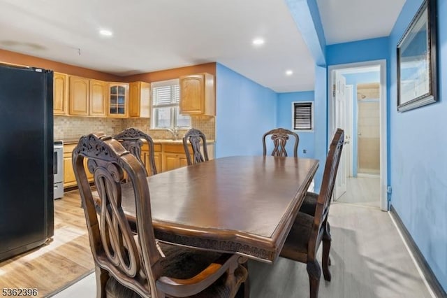 23 Foundry St, Newark City, NJ 07105 - dining area featuring light wood-style flooring, baseboards, and recessed lighting