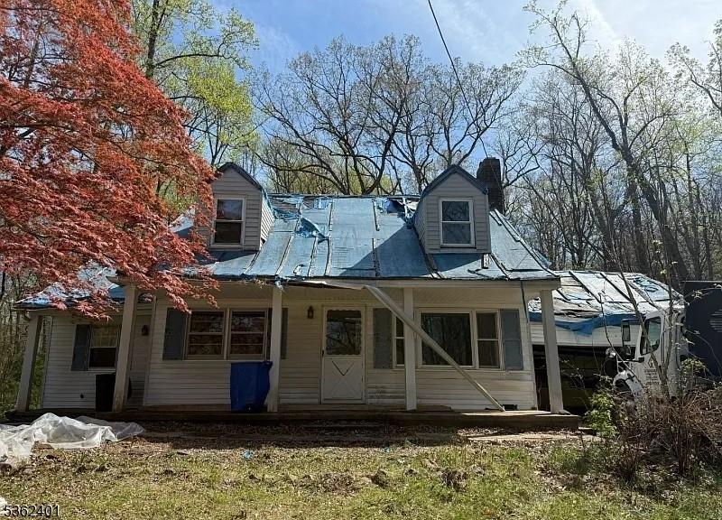 14 Ninth St, Warren Twp, NJ 07059 - view of front facade featuring a chimney