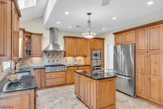 61 Bradley Ln, Bridgewater Twp, NJ 08807 - kitchen with stainless steel appliances, wall chimney exhaust hood, dark stone counters, tasteful backsplash, and a skylight