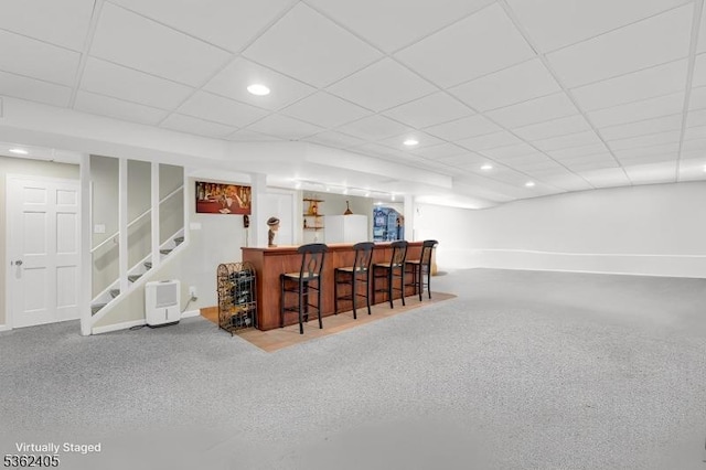 61 Bradley Ln, Bridgewater Twp, NJ 08807 - indoor dry bar with stairway, a paneled ceiling, and recessed lighting