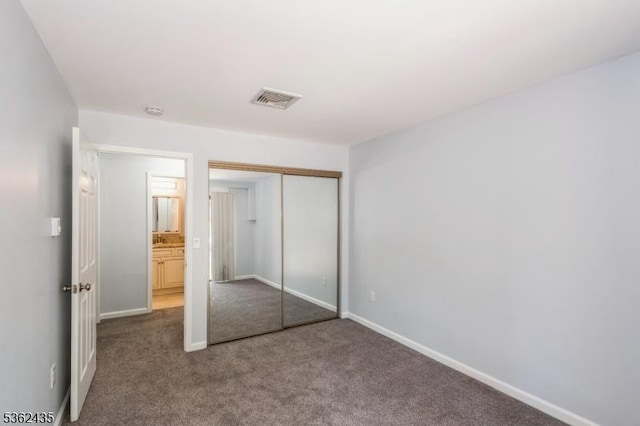 1 N Slope Unit 1, Union Twp, NJ 08809 - unfurnished bedroom with carpet floors, a closet, and baseboards
