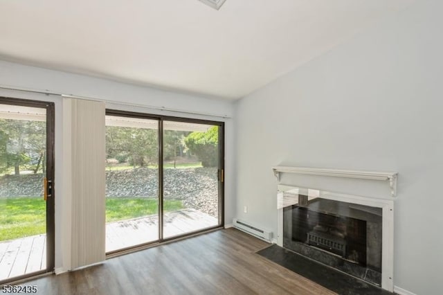 1 N Slope Unit 1, Union Twp, NJ 08809 - unfurnished living room with a baseboard heating unit, wood finished floors, and a fireplace with flush hearth