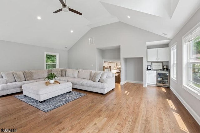 2335 Longfellow Ave, Scotch Plains Twp, NJ 07076 - living area with beverage cooler, a ceiling fan, healthy amount of natural light, high vaulted ceiling, and recessed lighting