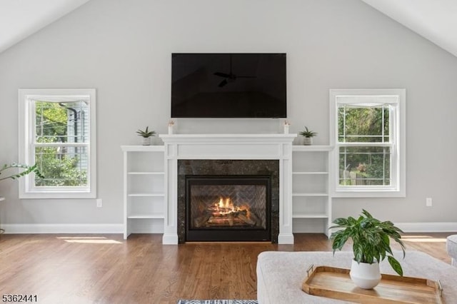 2335 Longfellow Ave, Scotch Plains Twp, NJ 07076 - living area with vaulted ceiling, wood finished floors, a fireplace, and healthy amount of natural light
