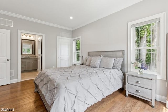 2335 Longfellow Ave, Scotch Plains Twp, NJ 07076 - bedroom with ornamental molding, wood finished floors, multiple windows, recessed lighting, and ensuite bathroom