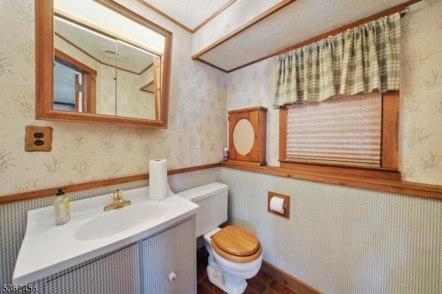 7 Claudia Rd, Hillsborough Twp, NJ 08844 - bathroom featuring toilet, vanity, wallpapered walls, and a wainscoted wall