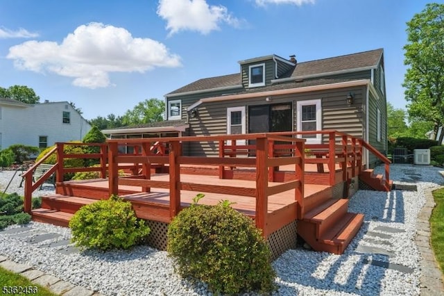 7 Claudia Rd, Hillsborough Twp, NJ 08844 - rear view of property featuring a wooden deck and a shingled roof