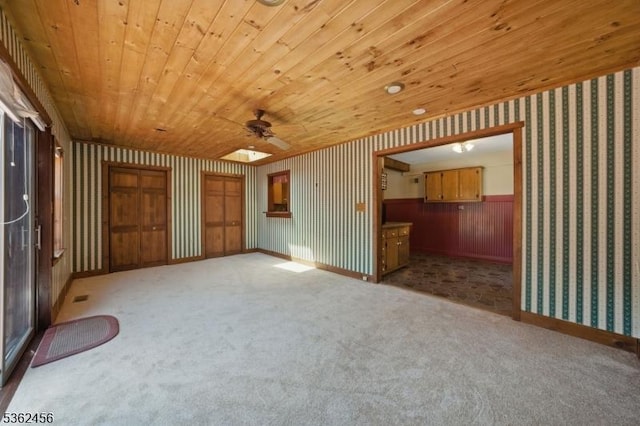 7 Claudia Rd, Hillsborough Twp, NJ 08844 - carpeted spare room featuring wallpapered walls, wooden ceiling, a ceiling fan, and baseboards