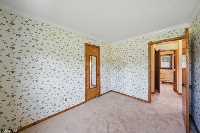 7 Claudia Rd, Hillsborough Twp, NJ 08844 - unfurnished room with crown molding, wallpapered walls, light colored carpet, and baseboards