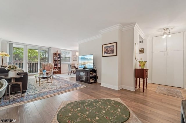 530 Valley Rd Unit 2D, Montclair Twp, NJ 07043 - living area featuring hardwood / wood-style floors and crown molding