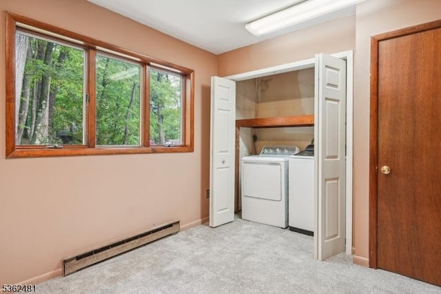 26 Bay View Rd, Hopatcong Boro, NJ 07843 - washroom featuring baseboard heating, washing machine and clothes dryer, light colored carpet, and baseboards