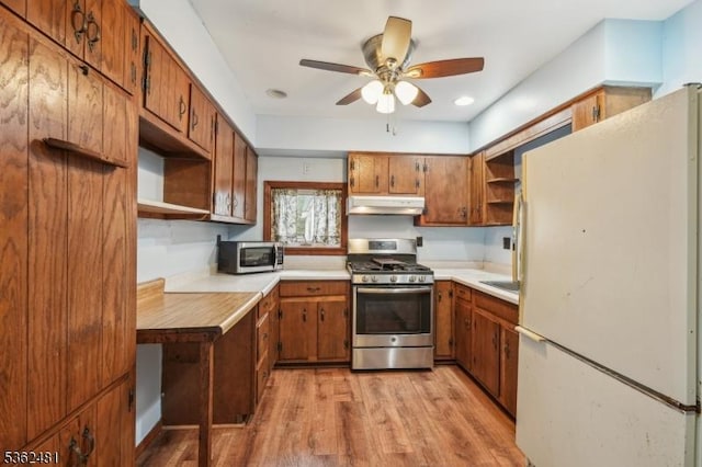 26 Bay View Rd, Hopatcong Boro, NJ 07843 - kitchen featuring appliances with stainless steel finishes, under cabinet range hood, open shelves, and brown cabinetry