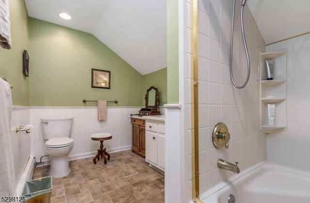 5 Hampton Rd, Mendham Boro, NJ 07945 - full bathroom with stone finish floors, vaulted ceiling, vanity, shower / bathtub combination, and wainscoting