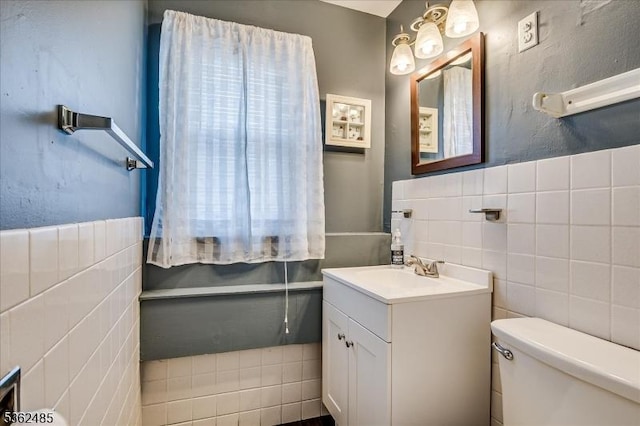 2145 Keller Crk, Union Twp, NJ 07083 - bathroom featuring tile walls, vanity, and toilet