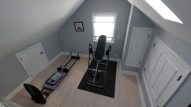 1247 Highland Ave, Union Twp, NJ 07083 - workout area featuring wood finished floors, lofted ceiling, and baseboards