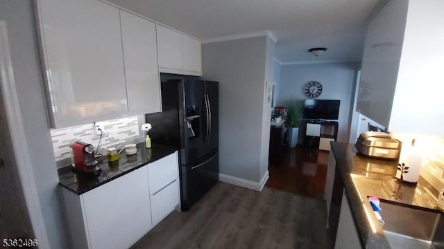 1247 Highland Ave, Union Twp, NJ 07083 - kitchen featuring modern cabinets, white cabinets, tasteful backsplash, wood finished floors, and crown molding