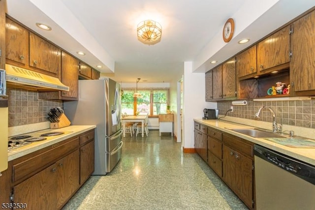 9 Ridge Rd, Roxbury Twp, NJ 07876 - kitchen featuring stainless steel appliances, a sink, light countertops, under cabinet range hood, and baseboards