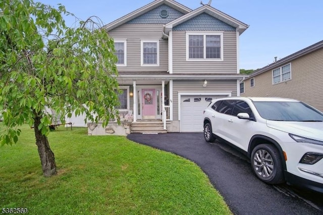 59 Guy St, Dover Town, NJ 07801 - view of front of home featuring an attached garage, a front lawn, and driveway