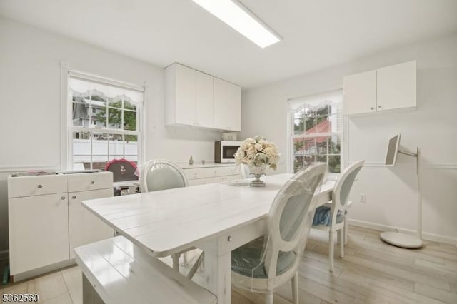 59 Guy St, Dover Town, NJ 07801 - dining space featuring light wood-style floors and baseboards