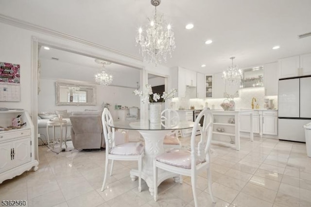 59 Guy St, Dover Town, NJ 07801 - dining room with a chandelier, recessed lighting, and crown molding