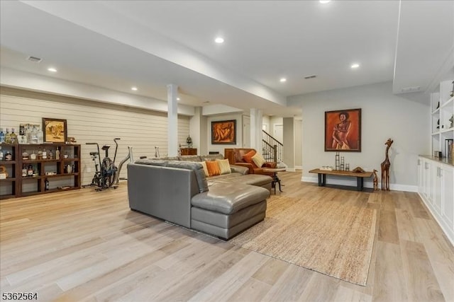 302 Tiffany Way Unit 302, Watchung Boro, NJ 07069 - living area with stairway, light wood finished floors, recessed lighting, and ornate columns