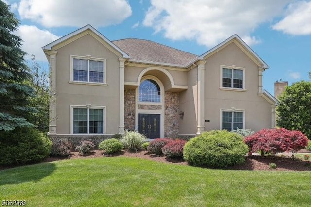 202 Old Sand Rd, Fairfield Twp, NJ 07004 - view of front of home with stone siding, stucco siding, and a front lawn