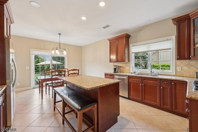 202 Old Sand Rd, Fairfield Twp, NJ 07004 - kitchen featuring stainless steel appliances, a sink, tasteful backsplash, recessed lighting, and light stone countertops