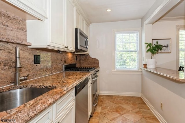 67-75 New England Ave Unit 71C, Summit City, NJ 07901 - kitchen featuring appliances with stainless steel finishes, a sink, backsplash, light stone counters, and recessed lighting