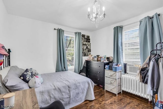 142 Westervelt Ave, North Plainfield Boro, NJ 07060 - bedroom with radiator, wood finished floors, a chandelier, and cooling unit