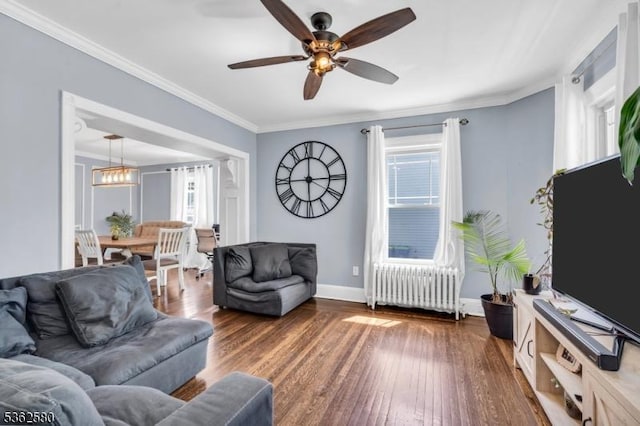 142 Westervelt Ave, North Plainfield Boro, NJ 07060 - living area featuring radiator heating unit, wood-type flooring, a ceiling fan, baseboards, and ornamental molding