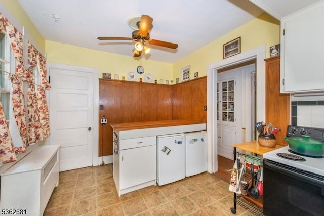 78 Broad St, Flemington Boro, NJ 08822 - kitchen with range with electric cooktop, ceiling fan, light countertops, and fridge