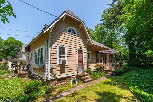 78 Broad St, Flemington Boro, NJ 08822 - view of side of home with a yard and cooling unit
