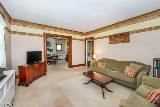 78 Broad St, Flemington Boro, NJ 08822 - living area with light carpet and radiator heating unit