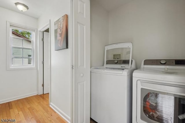 547 Logan Dr, Roxbury Twp, NJ 07850 - laundry area with independent washer and dryer, light wood-type flooring, and baseboards