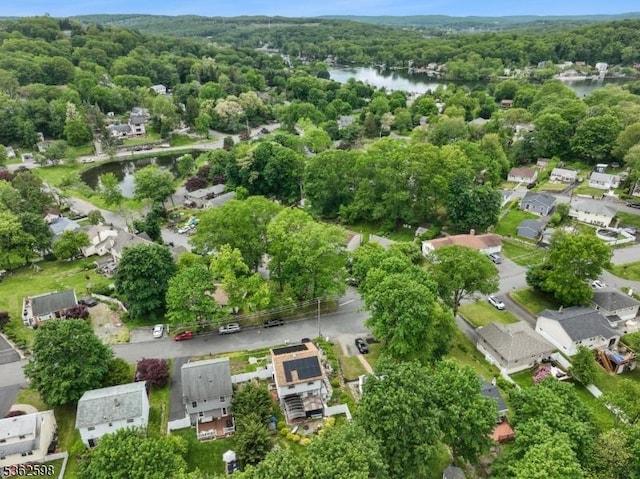 547 Logan Dr, Roxbury Twp, NJ 07850 - aerial overview of property's location featuring a large body of water and a forest