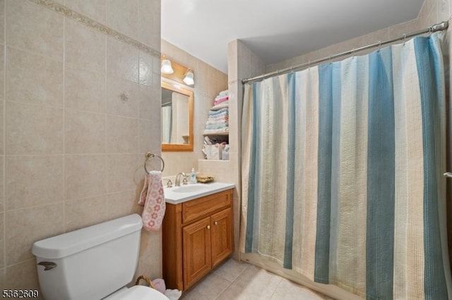 105 River Rd Unit A-3, Nutley Twp, NJ 07110 - full bath with vanity, toilet, tile patterned floors, a shower with shower curtain, and tile walls