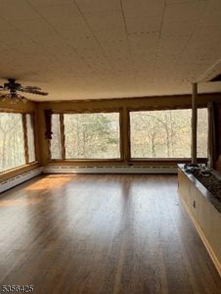 297 Terhune Dr, Wayne Twp, NJ 07470 - view of unfurnished sunroom
