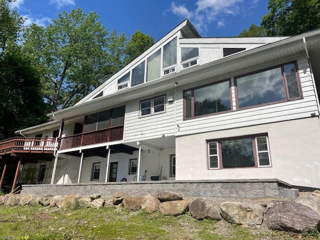 297 Terhune Dr, Wayne Twp, NJ 07470 - rear view of house with stucco siding