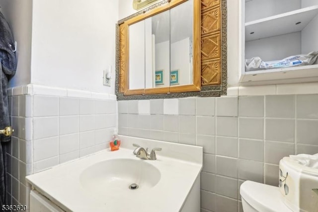 63 Hillsdale Rd, East Brunswick Twp, NJ 08816 - half bath with vanity, tile walls, and toilet