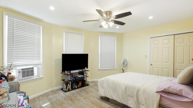 10 Lowden St, Elizabeth City, NJ 07208 - bedroom featuring cooling unit, light wood-type flooring, baseboards, recessed lighting, and a closet