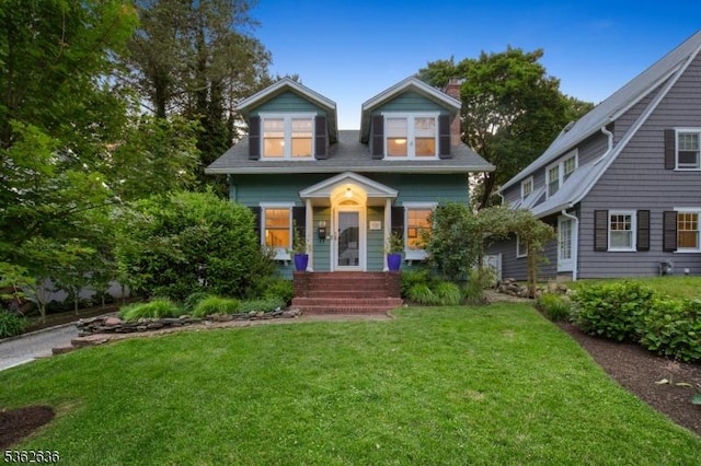 18 Park Ter, Montclair Twp, NJ 07043 - view of front of house with a front yard and a chimney