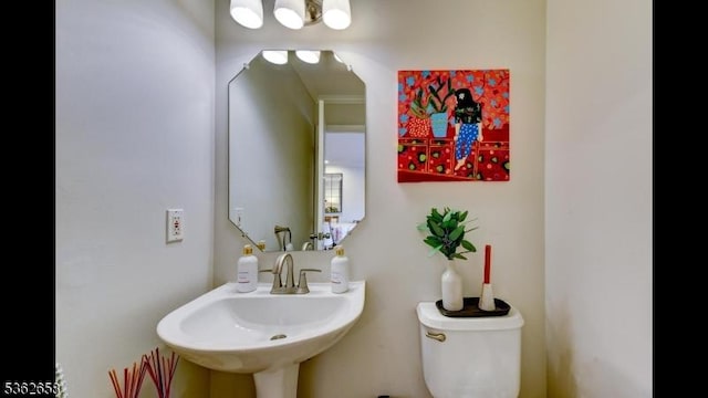 8 Clark Ct, Bernards Twp, NJ 07920 - half bathroom with toilet and a sink