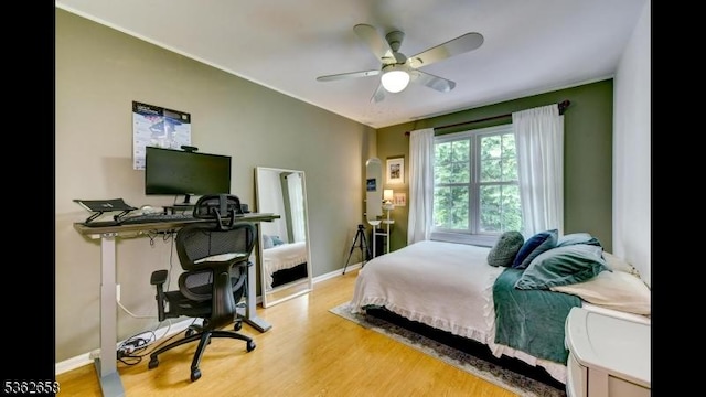 8 Clark Ct, Bernards Twp, NJ 07920 - bedroom featuring wood finished floors, an office area, and a ceiling fan