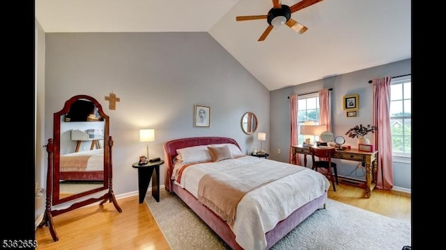 8 Clark Ct, Bernards Twp, NJ 07920 - bedroom with vaulted ceiling, light wood-style floors, and a ceiling fan