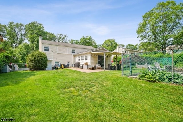 22 Corwin St, Randolph Twp, NJ 07869 - rear view of house with a patio area, an outdoor living space, and a chimney